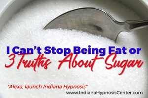 A spoon dipping into a bowl of sugar with the title,I Can’t Stop Being Fat or 3 Truths About Sugar 